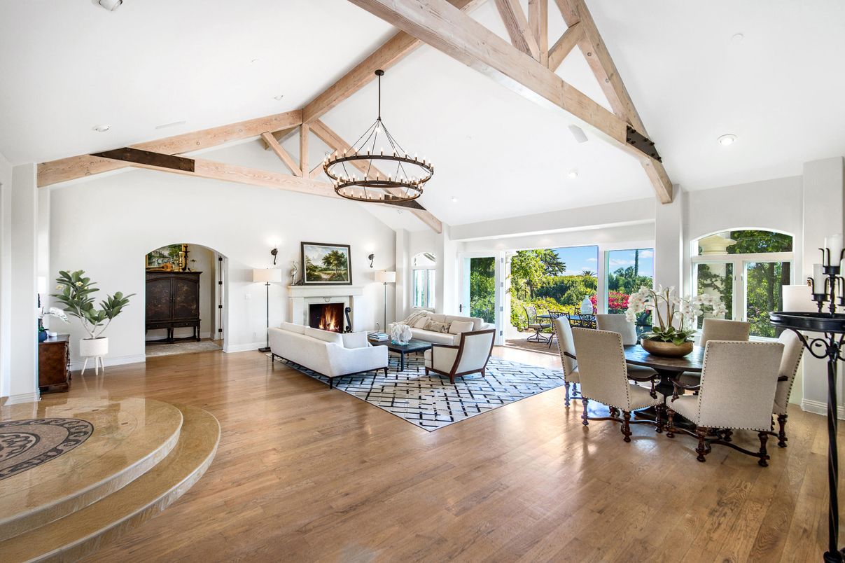 Chandelier, Dining room, Fireplace, Interior, Living room, Pendant Lights, Recessed Lighting, Wooden Beams, Wood Texture Flooring