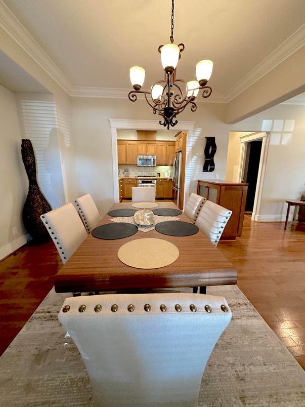 Chandelier, Dining room, Interior, Kitchen, Stainless Steel Appliances, Wood Texture Flooring