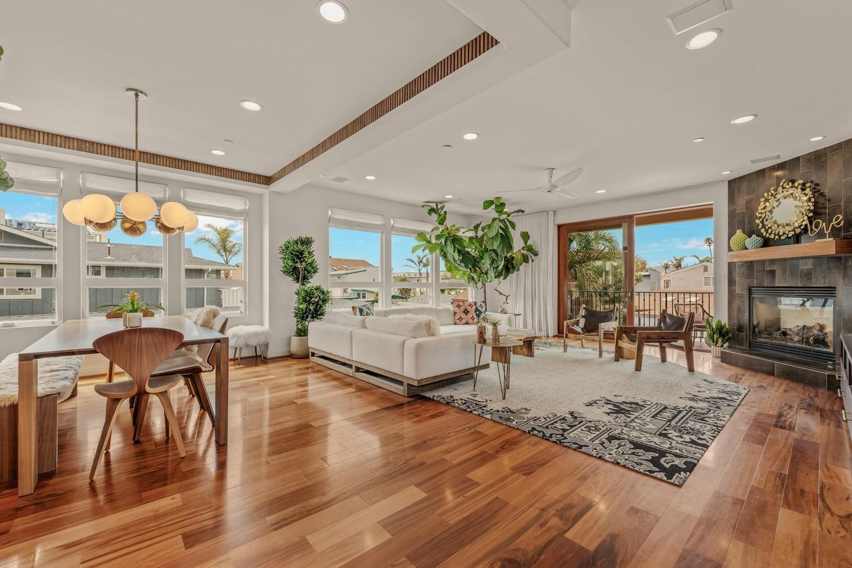 Dining room, Fireplace, Interior, Living room, Pendant Lights, Recessed Lighting, Wood Texture Flooring