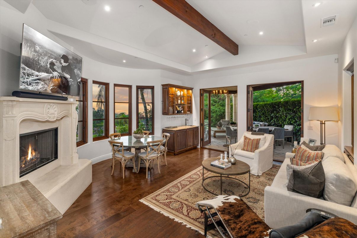 Dining room, Fireplace, Interior, Living room, Recessed Lighting, Wooden Beams, Wood Texture Flooring