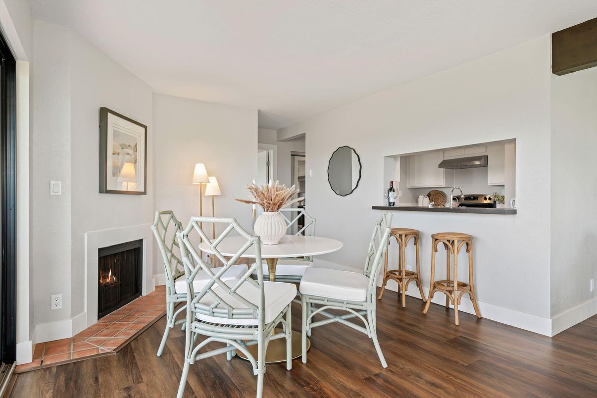 Dining room, Fireplace, Interior, Kitchen, Stainless Steel Appliances, Wood Texture Flooring