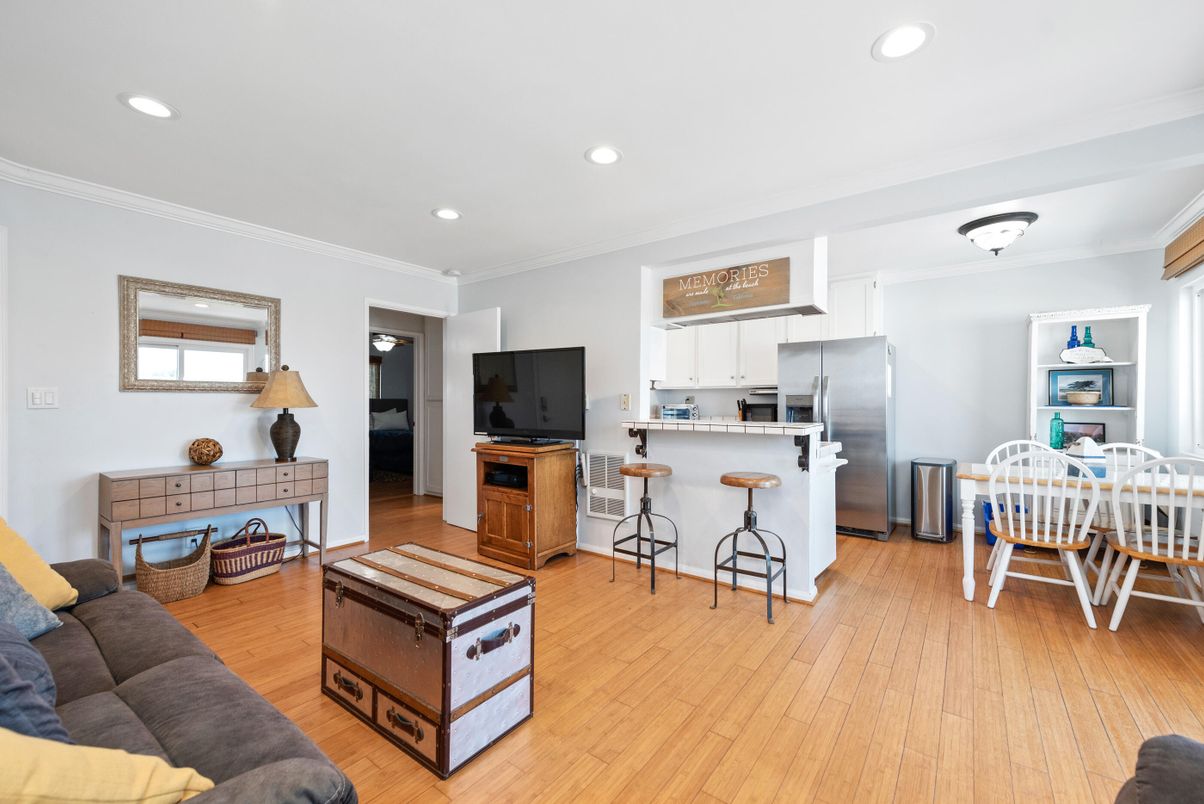 Dining room, Interior, Kitchen, Living room, Recessed Lighting, Stainless Steel Appliances, Wood Texture Flooring