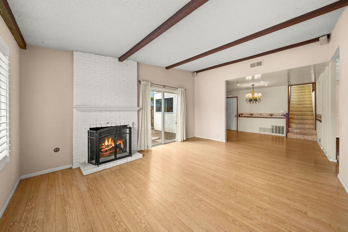 Chandelier, Empty room, Fireplace, Interior, Wooden Beams, Wood Texture Flooring