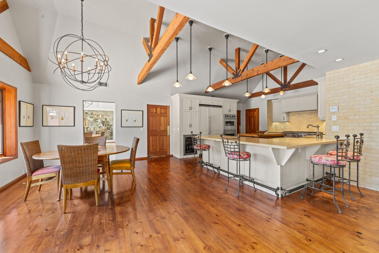 Chandelier, Dining room, Interior, Kitchen, Pendant Lights, Recessed Lighting, Stainless Steel Appliances, Wooden Beams, Wood Texture Flooring