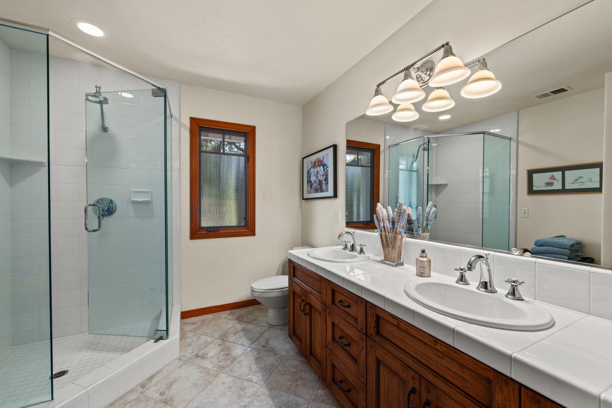 Bathroom, Dual Sink Vanities, Glass Shower, Interior, Recessed Lighting, Tile Countertops