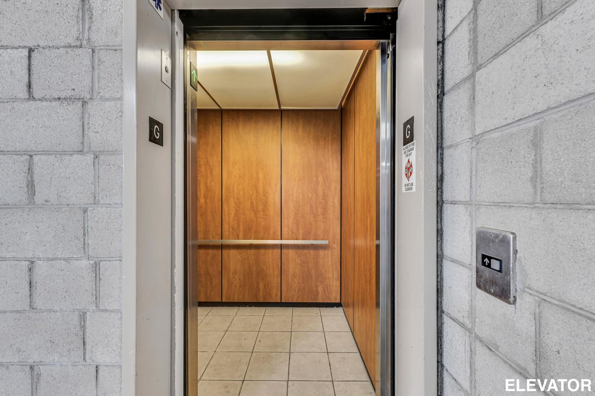 Elevator, Interior, Stone Walls, Wooden Walls