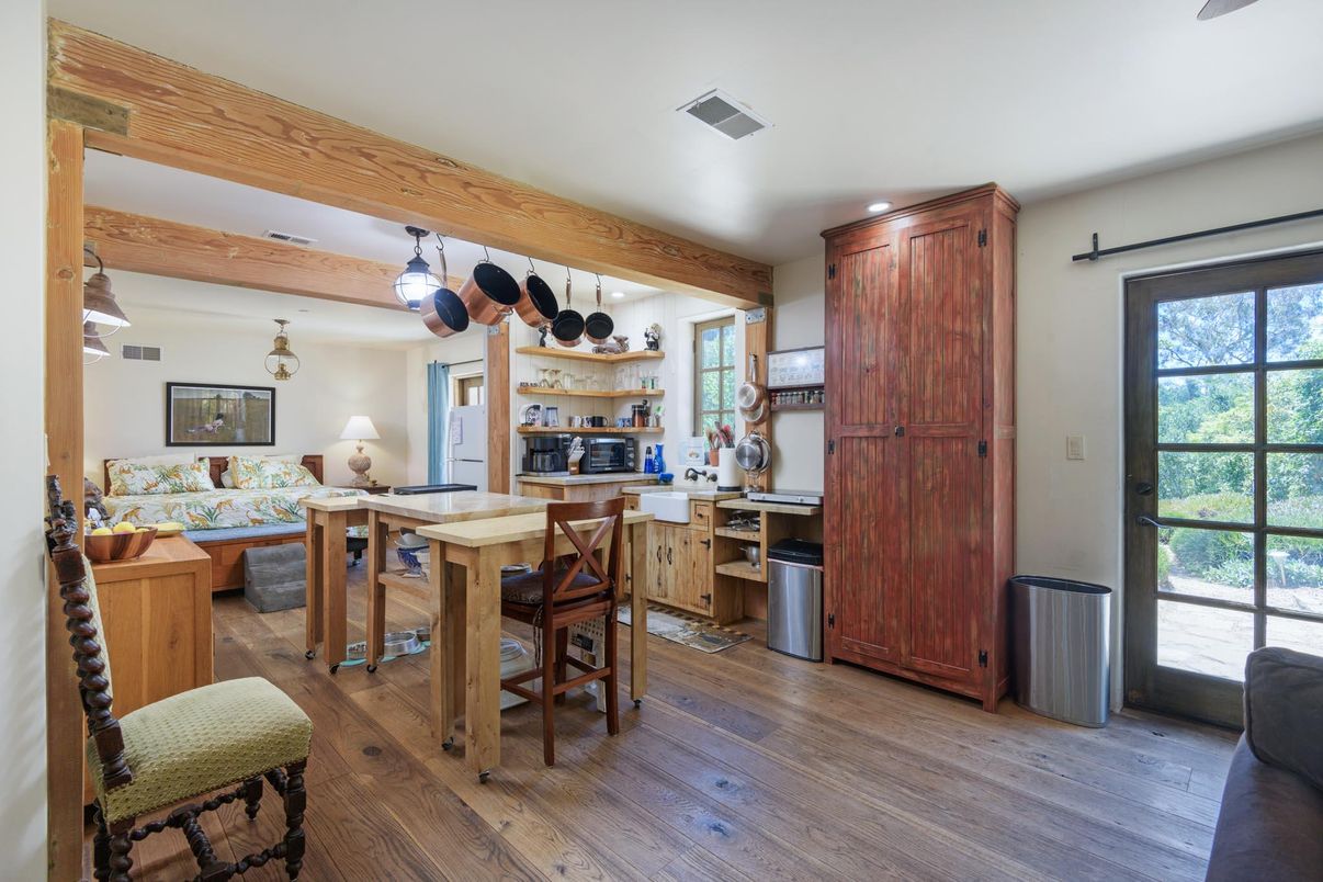 Dining room, Interior, Kitchen, Living room, Pendant Lights, Recessed Lighting, Stainless Steel Appliances, Wooden Beams, Wood Texture Flooring