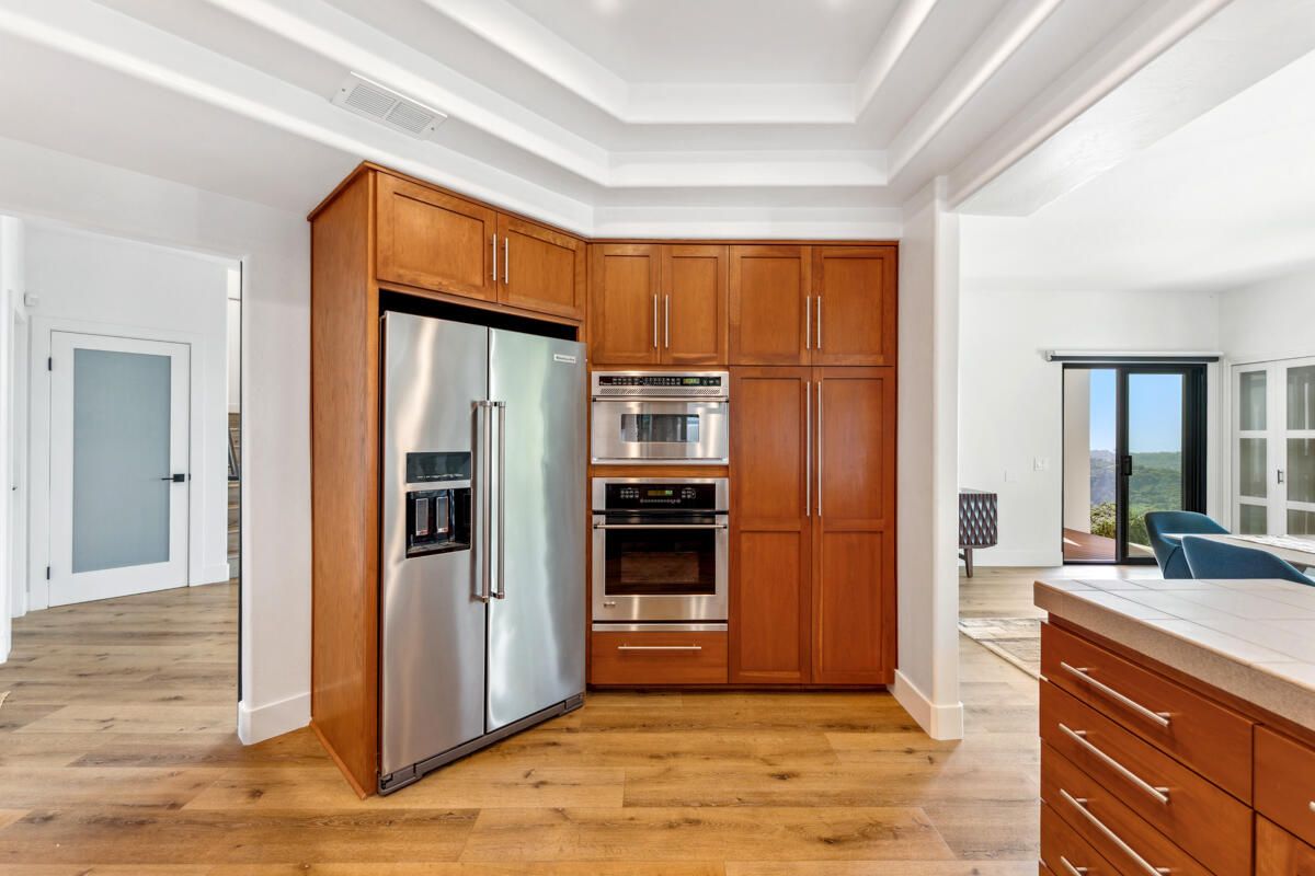 Interior, Kitchen, Recessed Lighting, Stainless Steel Appliances, Tile Countertops, Wood Texture Flooring
