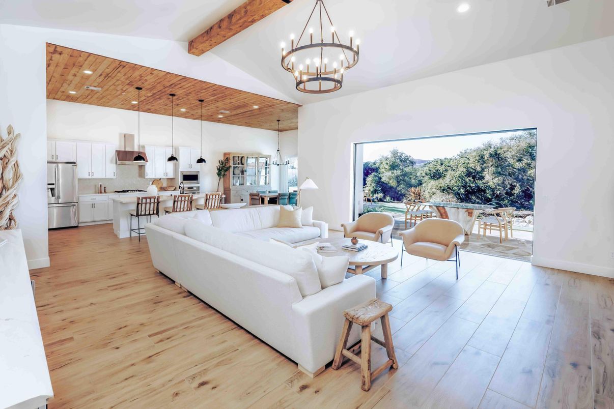 Chandelier, Interior, Kitchen, Living room, Pendant Lights, Recessed Lighting, Stainless Steel Appliances, Wooden Beams, Wooden Ceilings, Wood Texture Flooring