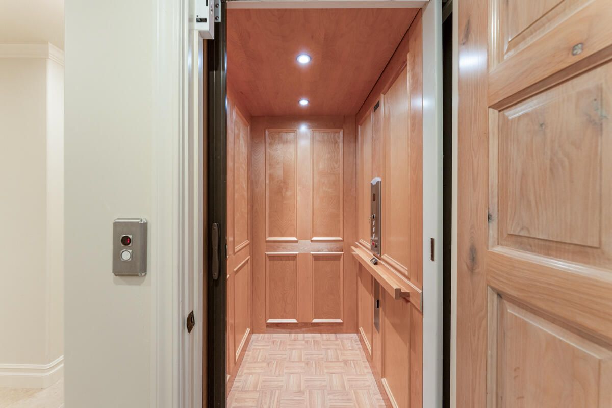 Elevator, Interior, Recessed Lighting, Wooden Ceilings, Wood Texture Flooring, Wooden Walls
