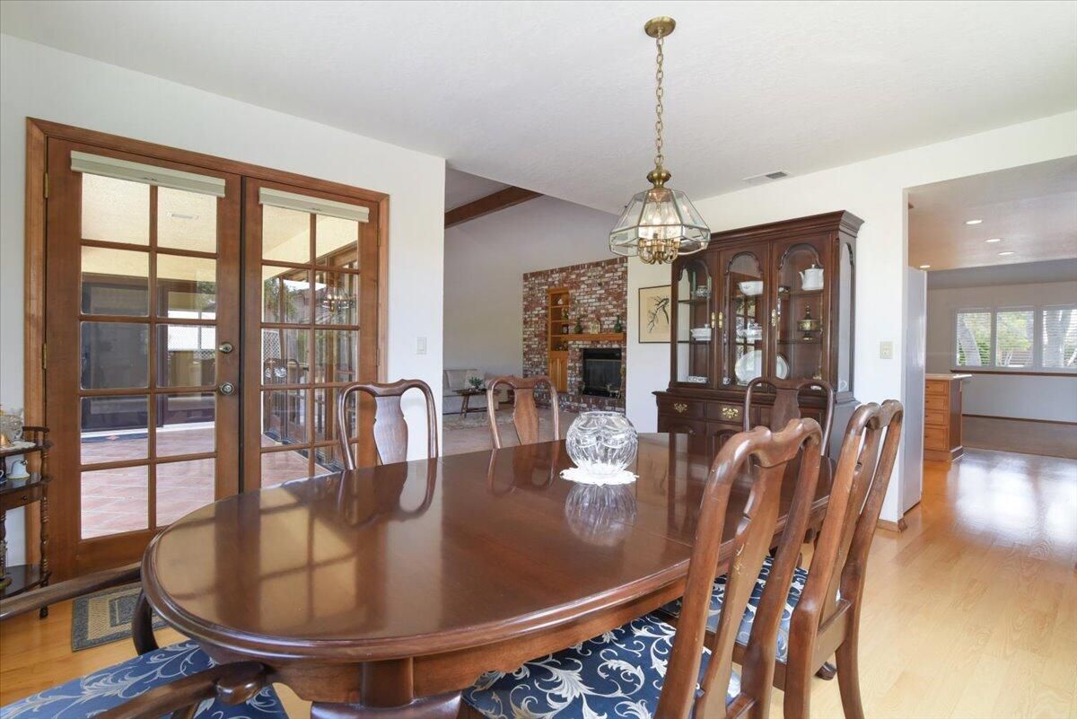 Dining room, Fireplace, Interior, Pendant Lights, Recessed Lighting, Wood Texture Flooring