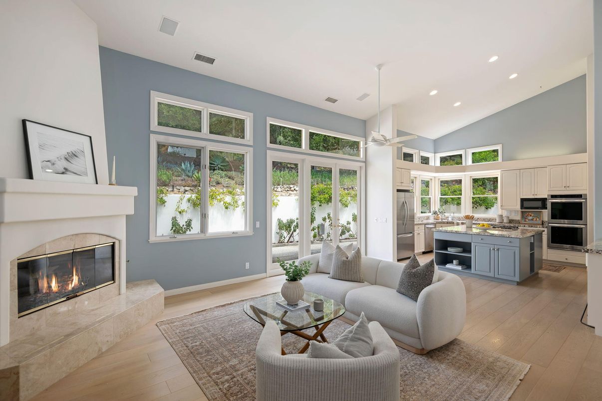 Fireplace, Interior, Kitchen, Living room, Pendant Lights, Recessed Lighting, Stainless Steel Appliances, Wood Texture Flooring