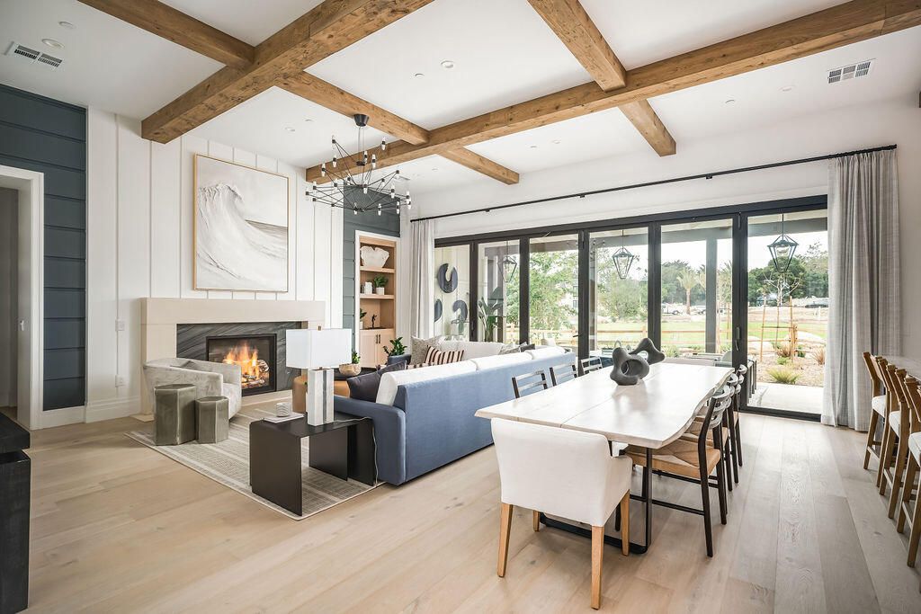 Chandelier, Dining room, Fireplace, Interior, Living room, Recessed Lighting, Wooden Beams, Wood Texture Flooring