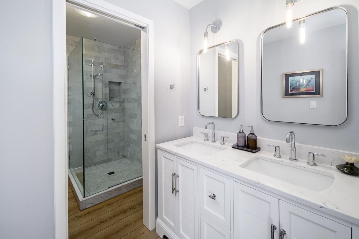 Bathroom, Dual Sink Vanities, Glass Shower, Interior, Wood Texture Flooring
