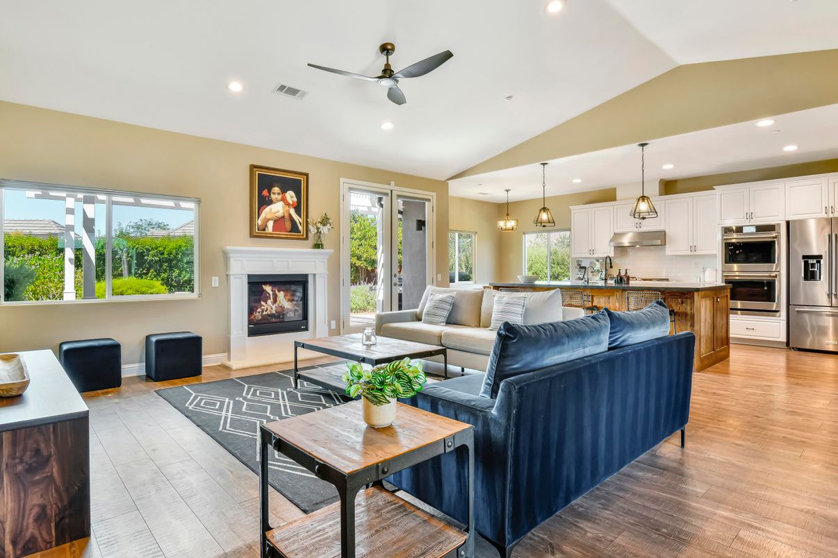 Fireplace, Interior, Kitchen, Living room, Pendant Lights, Recessed Lighting, Stainless Steel Appliances, Wood Texture Flooring
