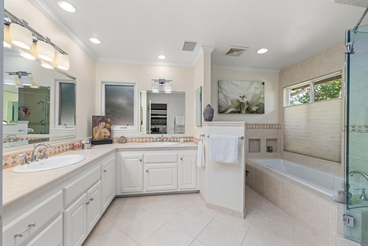 Bathroom, Dual Sink Vanities, Glass Shower, Interior, Recessed Lighting, Tile Countertops