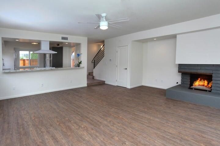 Empty room, Fireplace, Interior, Recessed Lighting, Wood Texture Flooring