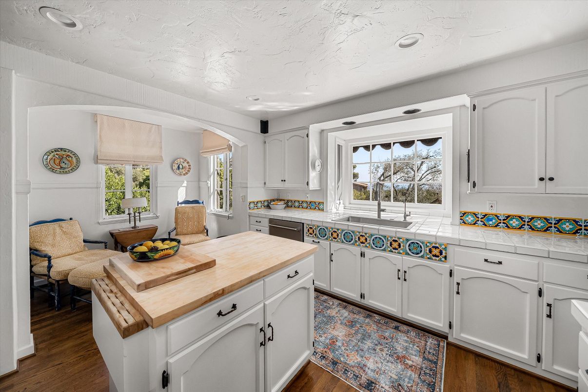 Interior, Kitchen, Recessed Lighting, Tile Countertops, Wood Texture Flooring