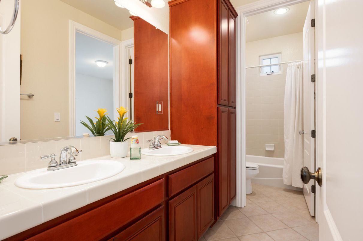Bathroom, Dual Sink Vanities, Interior, Recessed Lighting, Tile Countertops