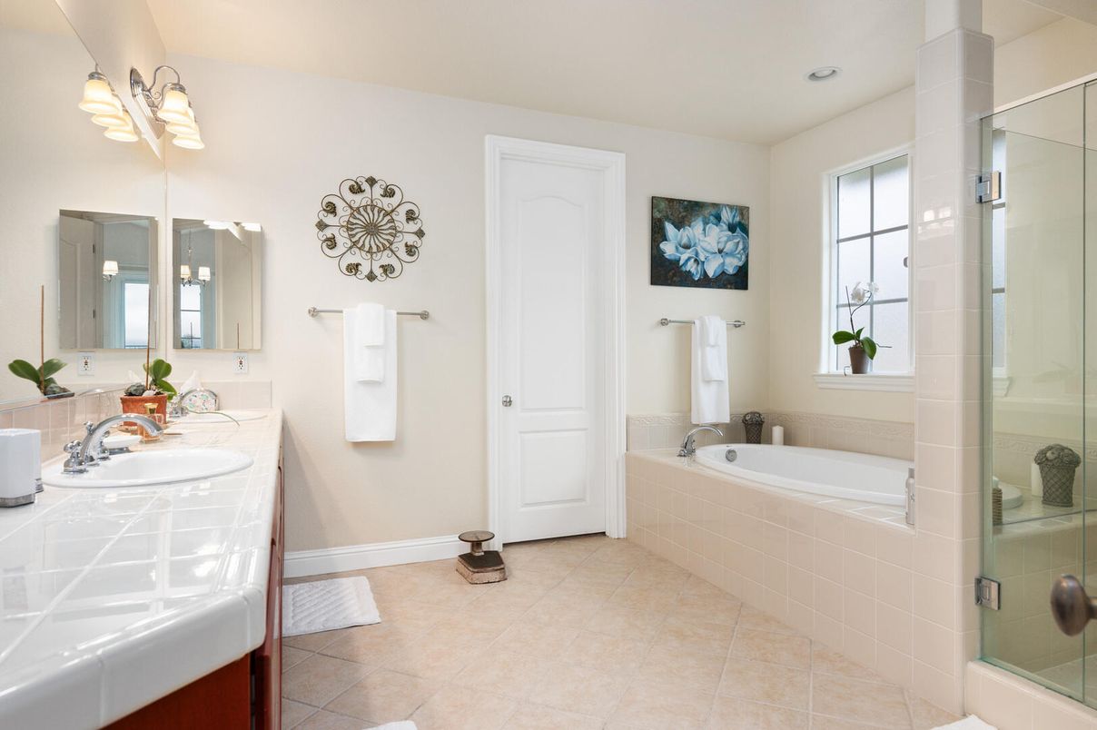 Bathroom, Dual Sink Vanities, Glass Shower, Interior, Recessed Lighting, Tile Countertops