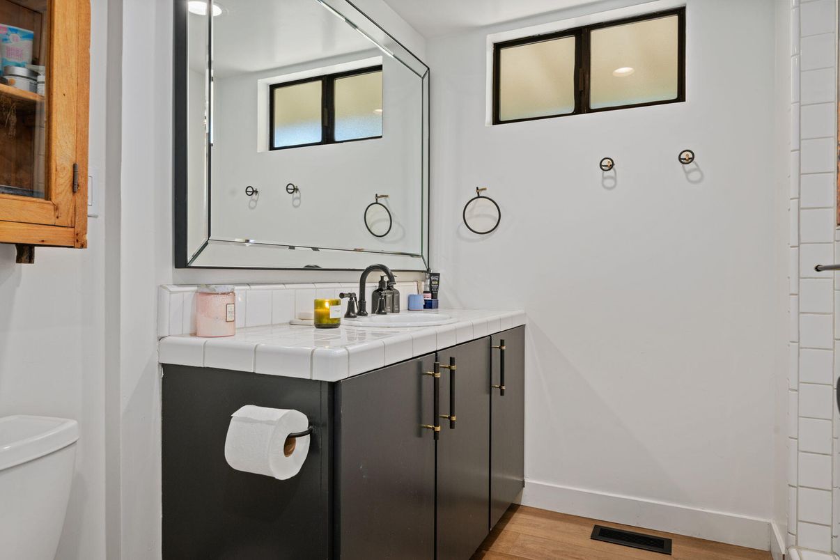 Bathroom, Interior, Recessed Lighting, Tile Countertops, Wood Texture Flooring