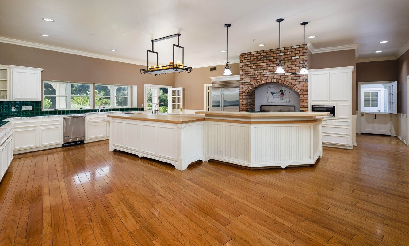 Fireplace, Interior, Kitchen, Pendant Lights, Recessed Lighting, Stone Walls, Wood Texture Flooring