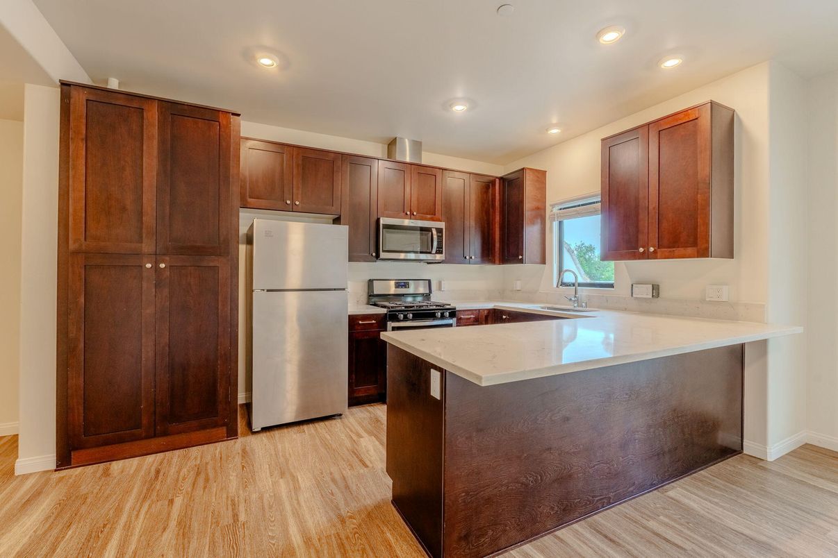Interior, Kitchen, Recessed Lighting, Stainless Steel Appliances, Wood Texture Flooring