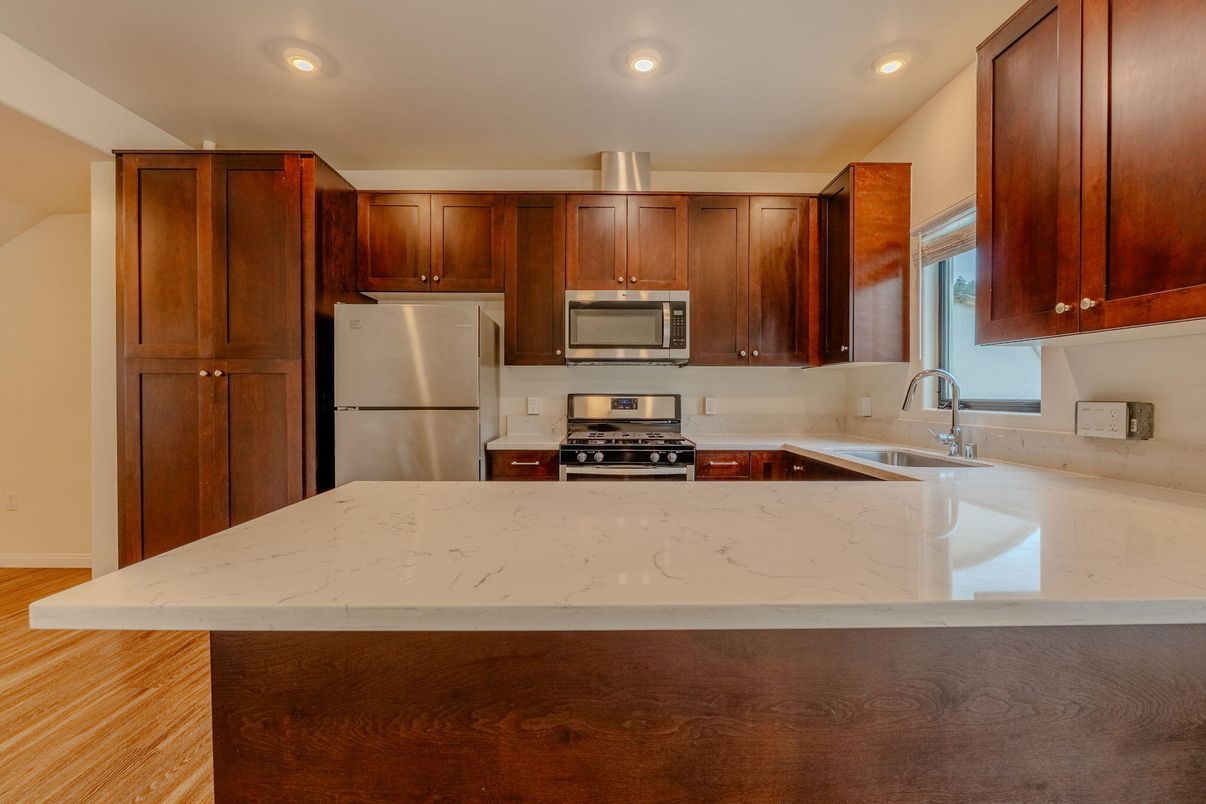Interior, Kitchen, Recessed Lighting, Stainless Steel Appliances, Wood Texture Flooring