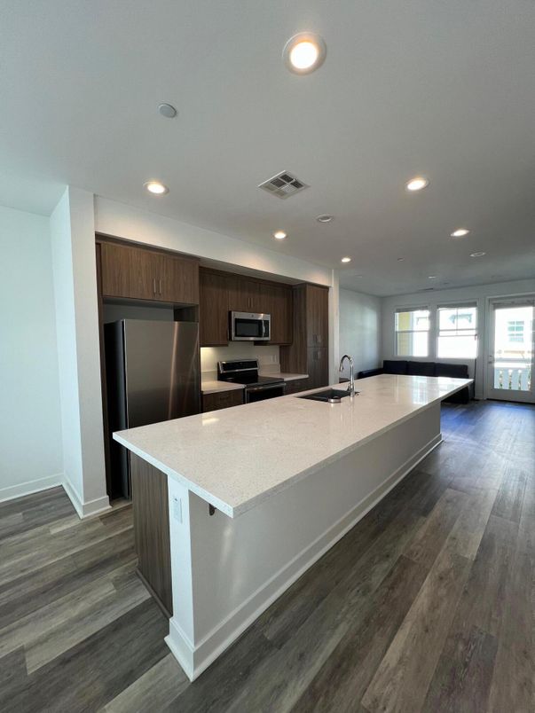 Interior, Kitchen, Recessed Lighting, Stainless Steel Appliances, Wood Texture Flooring