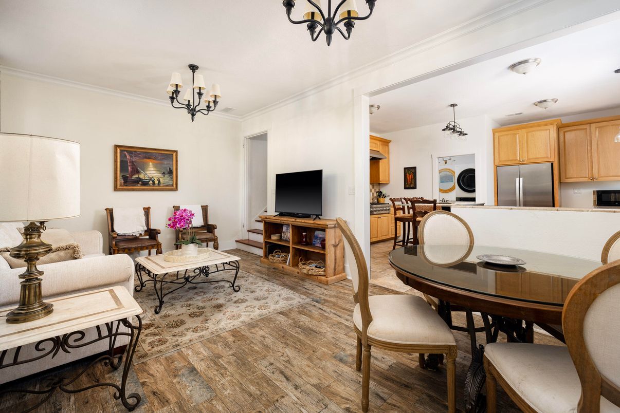 Chandelier, Dining room, Interior, Kitchen, Living room, Stainless Steel Appliances, Wood Texture Flooring