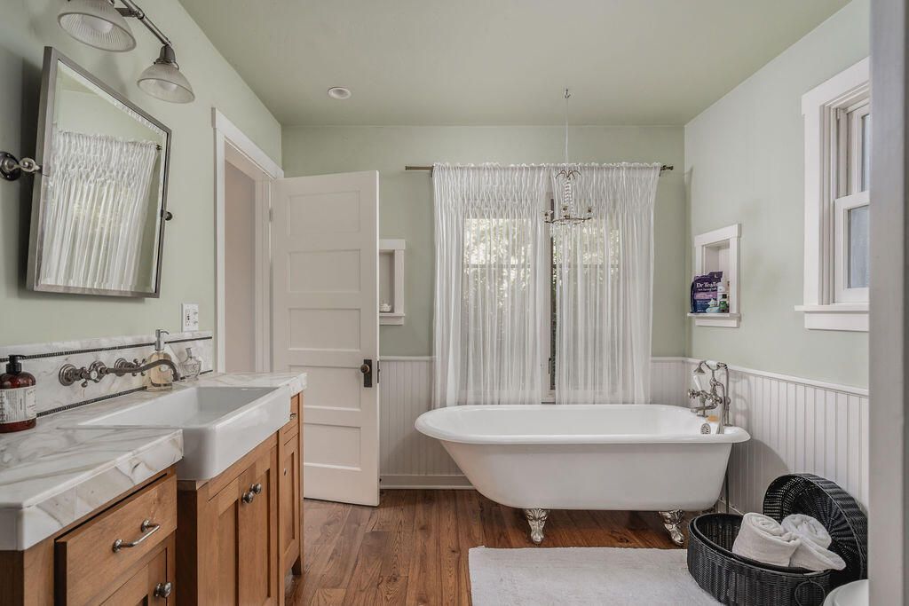 Bathroom, Chandelier, Dual Sink Vanities, Free Standing Baths, Interior, Recessed Lighting, Wood Texture Flooring