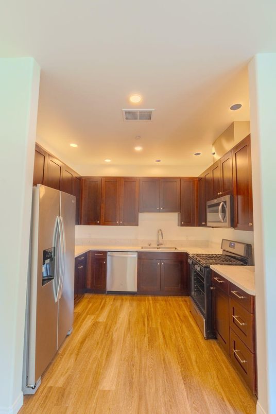 Interior, Kitchen, Recessed Lighting, Stainless Steel Appliances, Wood Texture Flooring