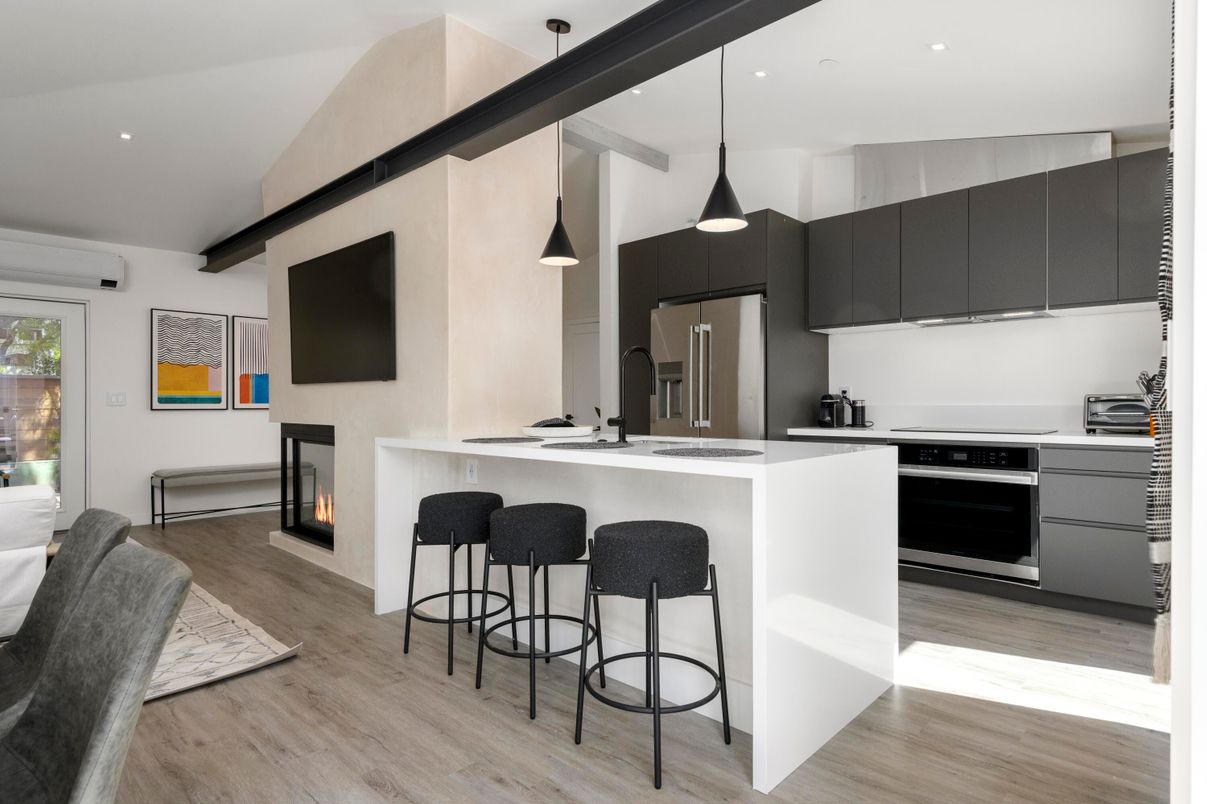 Fireplace, Interior, Kitchen, Pendant Lights, Recessed Lighting, Stainless Steel Appliances, Wood Texture Flooring