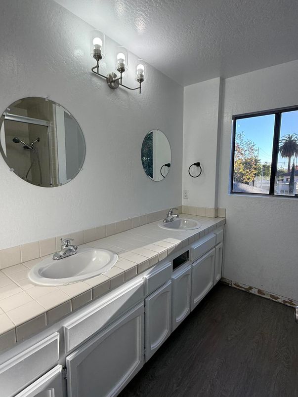 Bathroom, Dual Sink Vanities, Interior, Tile Countertops, Wood Texture Flooring