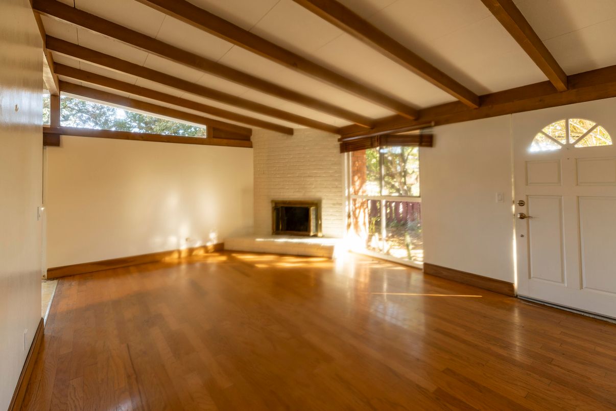 Empty room, Fireplace, Interior, Stone Walls, Wooden Beams, Wood Texture Flooring