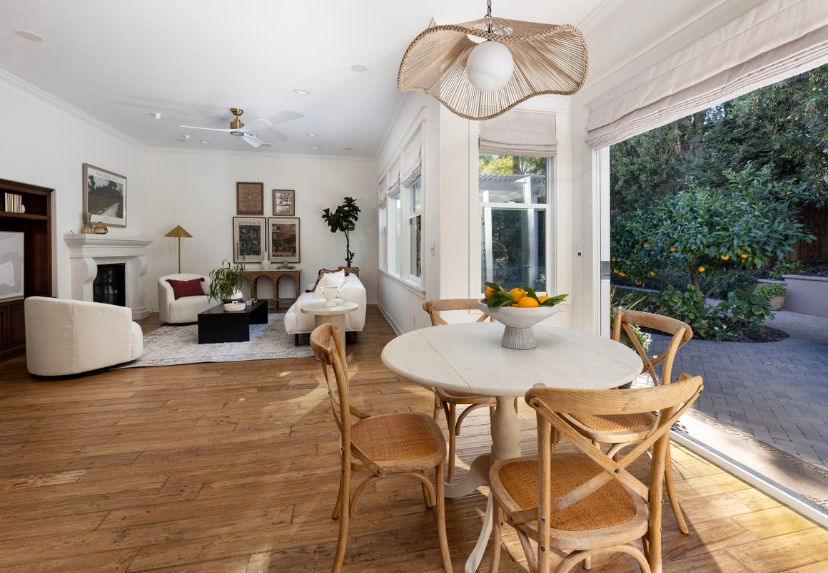 Dining room, Fireplace, Interior, Living room, Recessed Lighting, Wood Texture Flooring