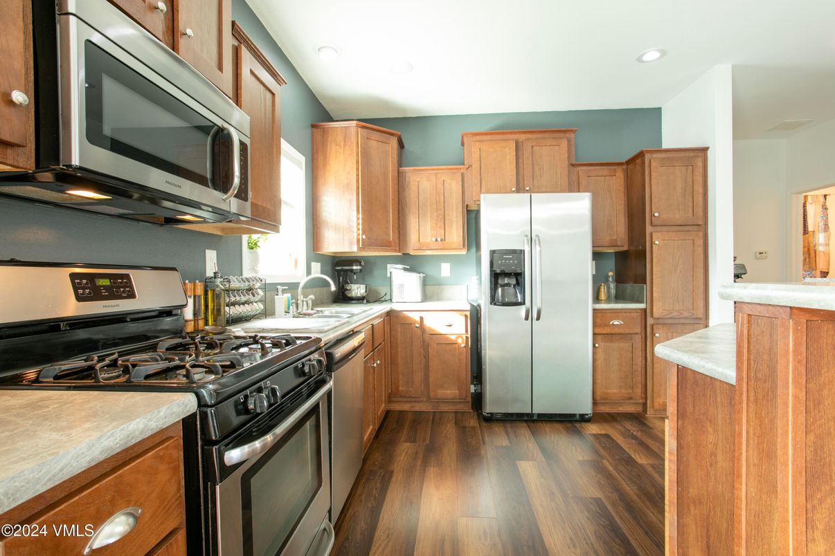 Interior, Kitchen, Recessed Lighting, Stainless Steel Appliances, Wood Texture Flooring