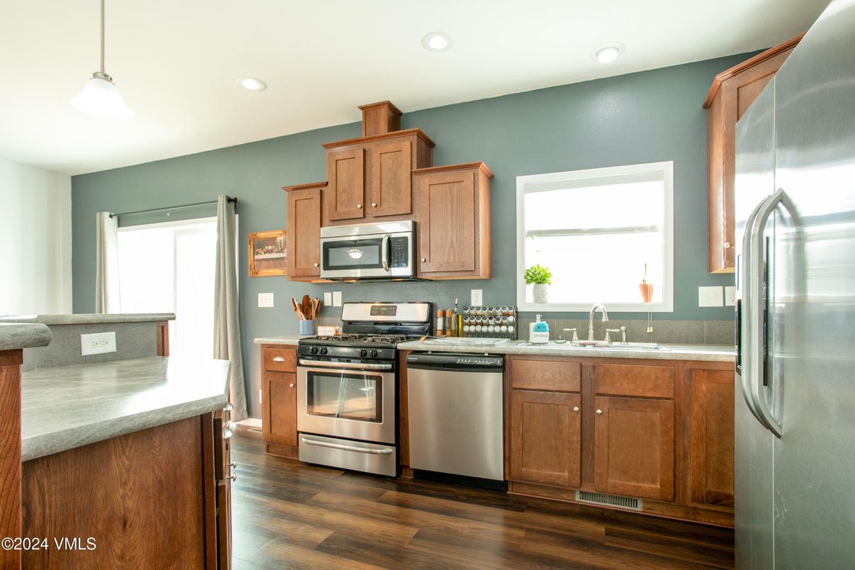 Interior, Kitchen, Pendant Lights, Recessed Lighting, Stainless Steel Appliances, Wood Texture Flooring