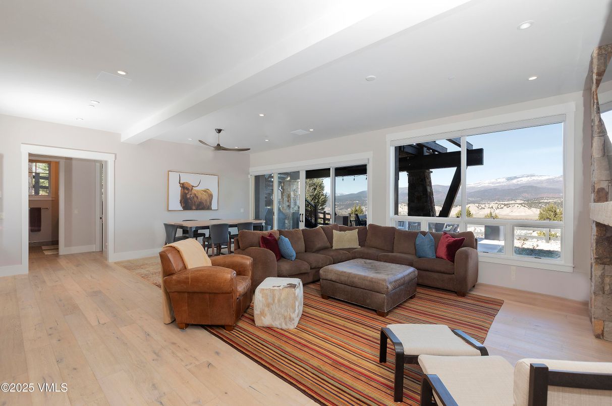 Dining room, Fireplace, Interior, Living room, Recessed Lighting, Wood Texture Flooring