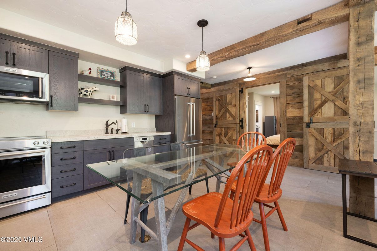 Dining room, Interior, Kitchen, Pendant Lights, Recessed Lighting, Stainless Steel Appliances, Wooden Walls