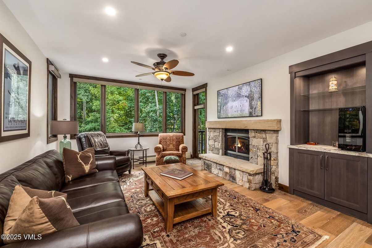 Fireplace, Interior, Living room, Recessed Lighting, Wood Texture Flooring