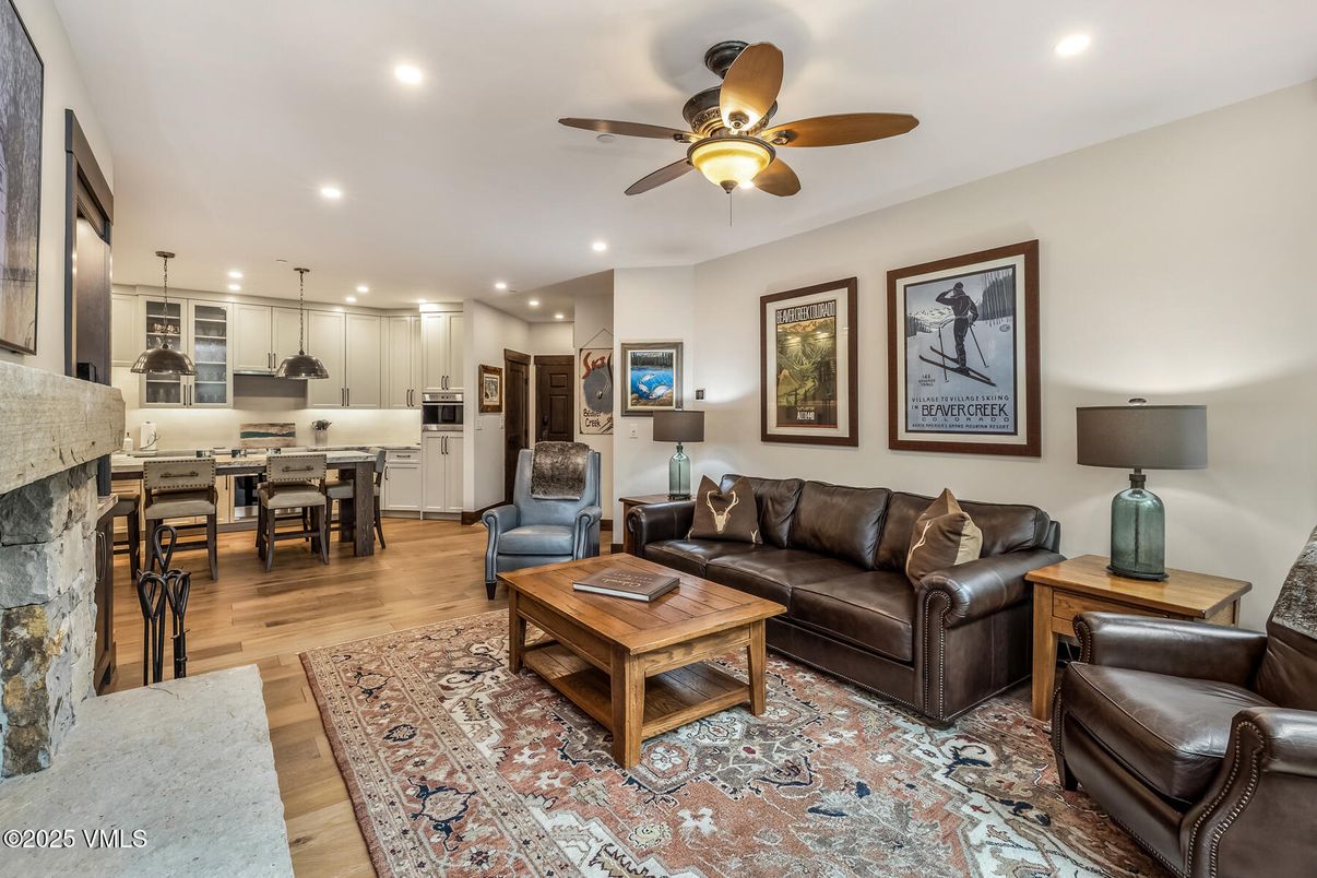 Dining room, Fireplace, Interior, Kitchen, Living room, Pendant Lights, Recessed Lighting, Stainless Steel Appliances, Wood Texture Flooring