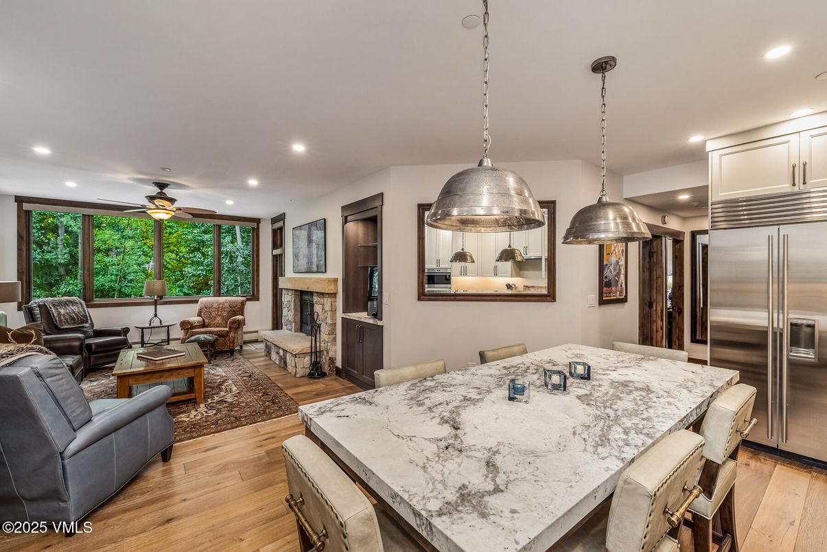 Dining room, Interior, Kitchen, Living room, Pendant Lights, Recessed Lighting, Stainless Steel Appliances, Wood Texture Flooring