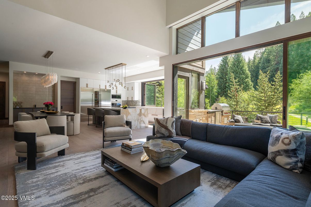 Dining room, Interior, Kitchen, Living room, Pendant Lights, Recessed Lighting, Stainless Steel Appliances, Wood Texture Flooring