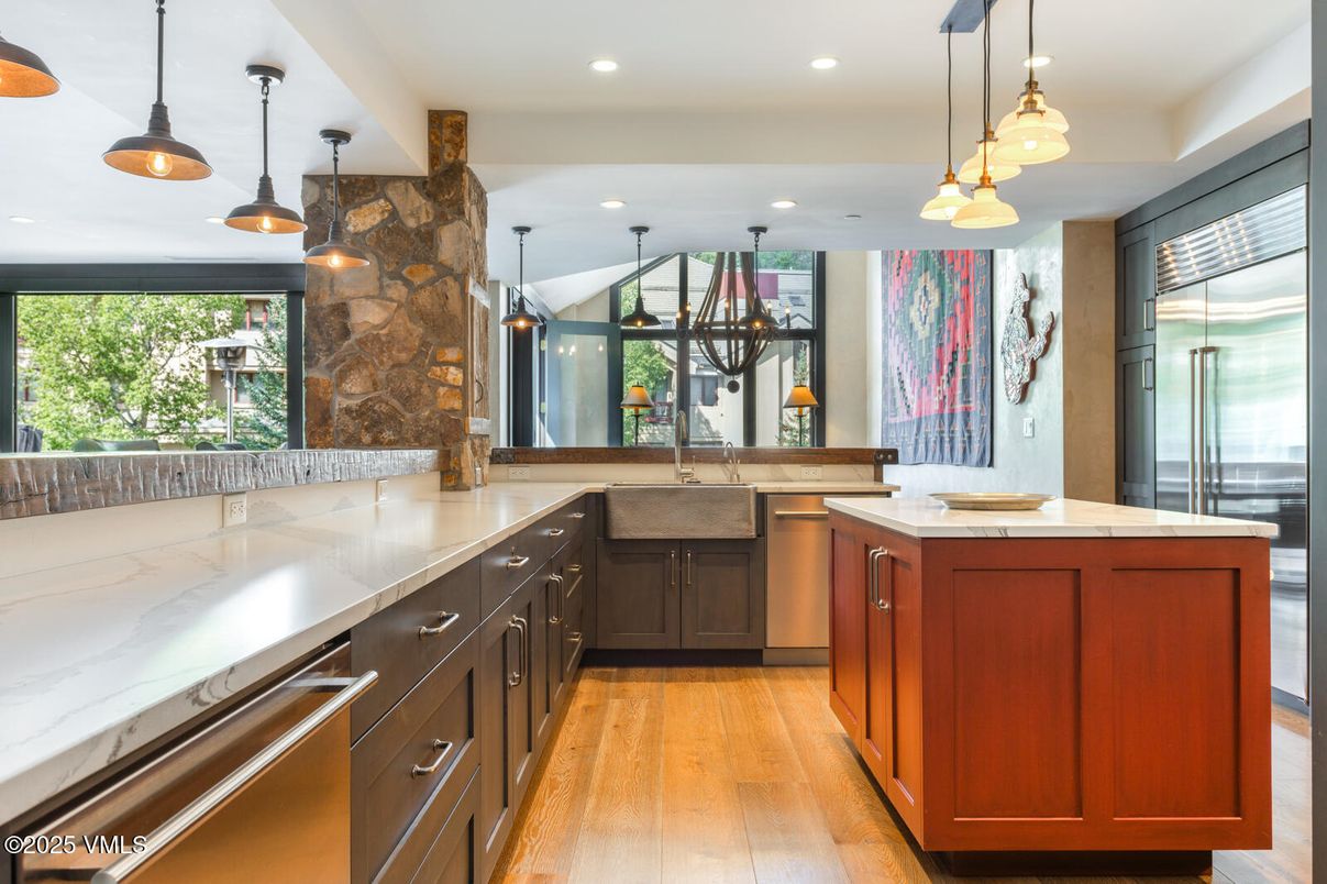 Interior, Kitchen, Pendant Lights, Recessed Lighting, Stainless Steel Appliances, Stone Walls, Wood Texture Flooring