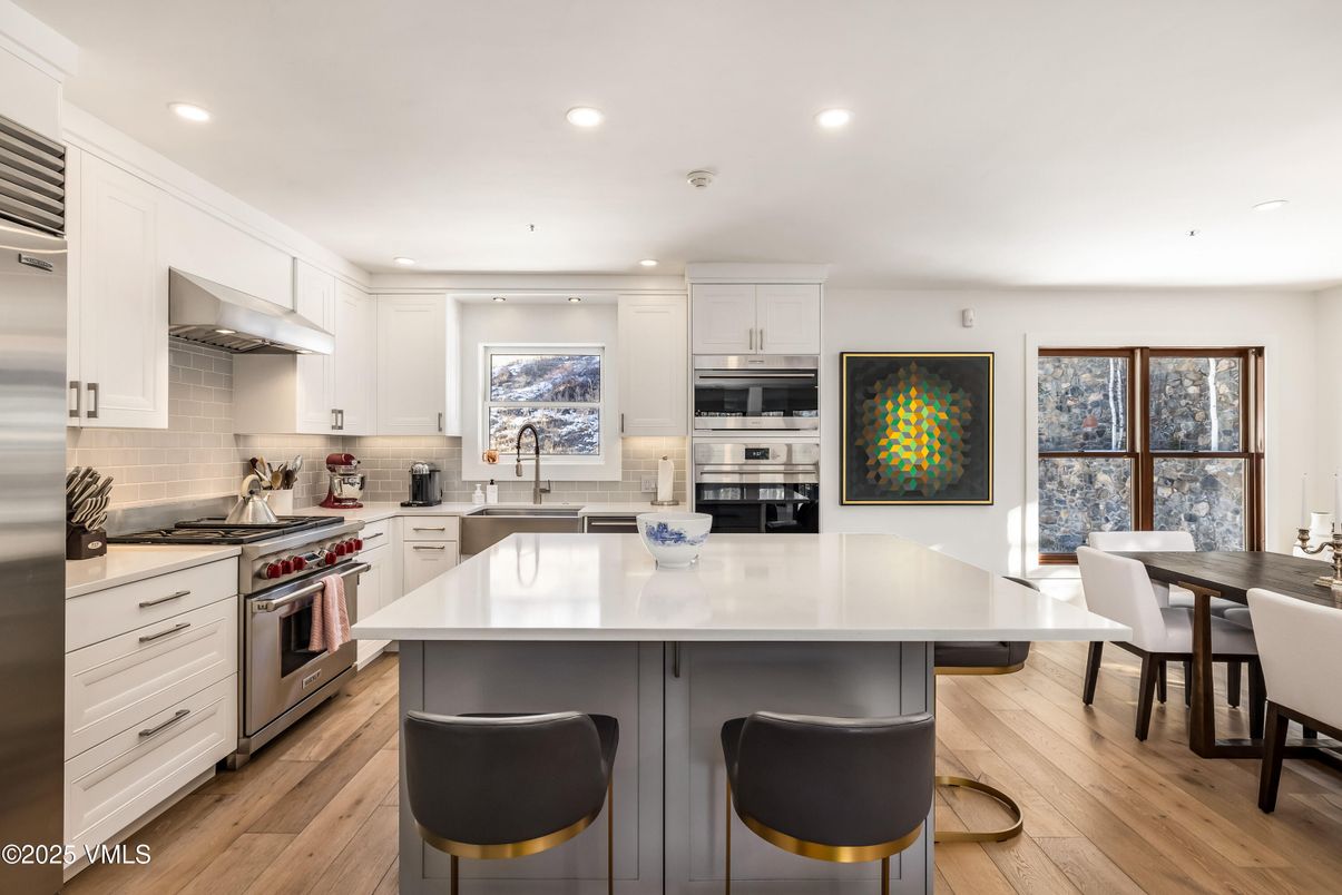 Dining room, Interior, Kitchen, Recessed Lighting, Stainless Steel Appliances, Wood Texture Flooring
