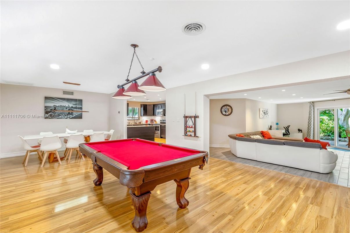 Billiard Table, Dining room, Game Room, Interior, Living room, Pendant Lights, Recessed Lighting, Wood Texture Flooring