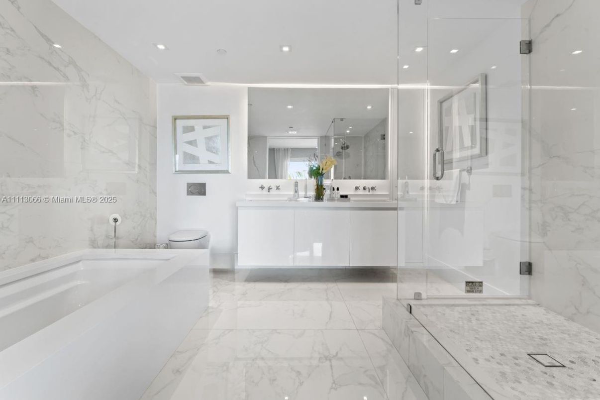 Bathroom, Dual Sink Vanities, Glass Shower, Interior, Marble, Marble Walls, Recessed Lighting