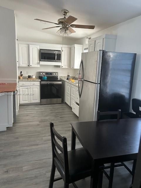 Dining room, Interior, Kitchen, Stainless Steel Appliances, Wood Texture Flooring
