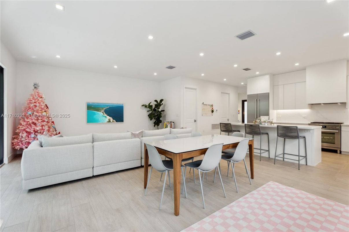 Dining room, Interior, Kitchen, Living room, Recessed Lighting, Stainless Steel Appliances, Wood Texture Flooring